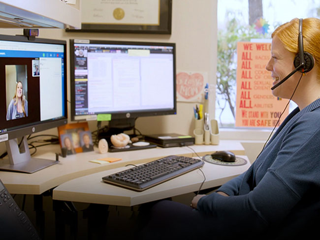 Doctor Emily West talks with Karissa Yoakum through telehealth.