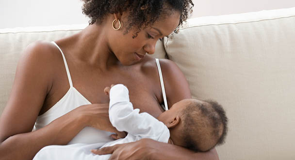 Parent breastfeeding their baby