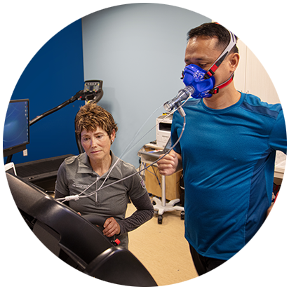 Physical therapist guiding patient through running fitness test