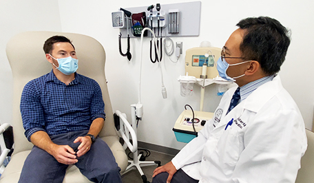 Doctor speaking with patient