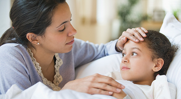 Parent checking child’s fever