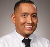 Photo of Justin Flores Estaris, MD