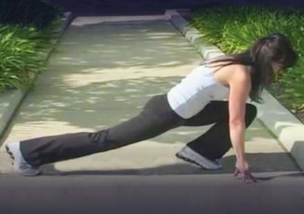 woman stretching legs outside