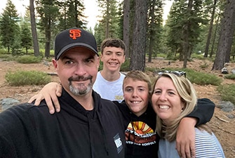 Mariann Stephens and her family taking a selfie at Lake Tahoe